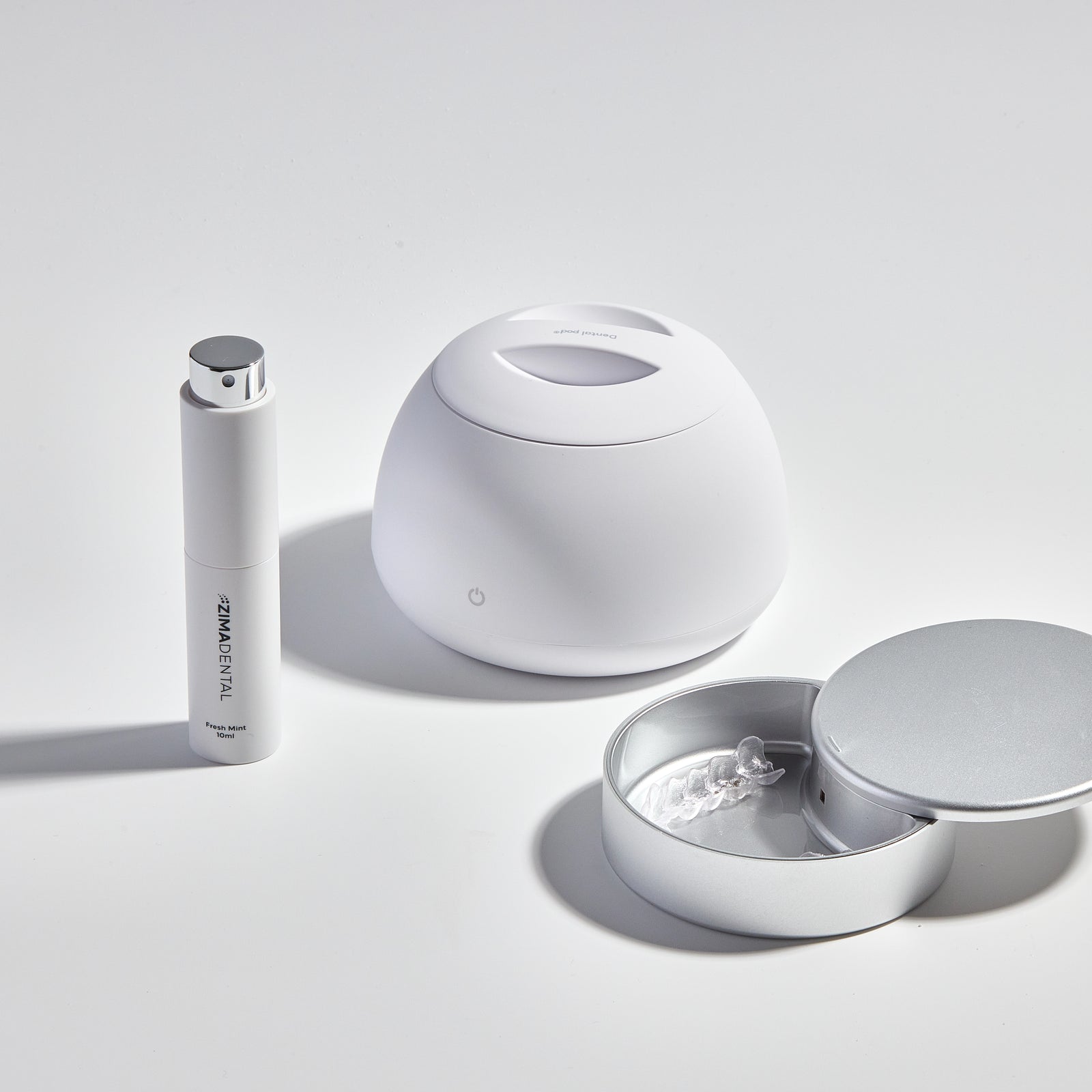 Dental Pod e acessórios sobre mesa